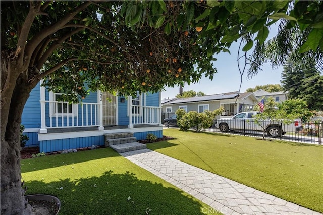 view of front of home featuring a front yard