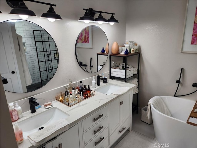 bathroom featuring a tub to relax in and vanity