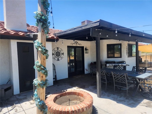 back of house with a patio area