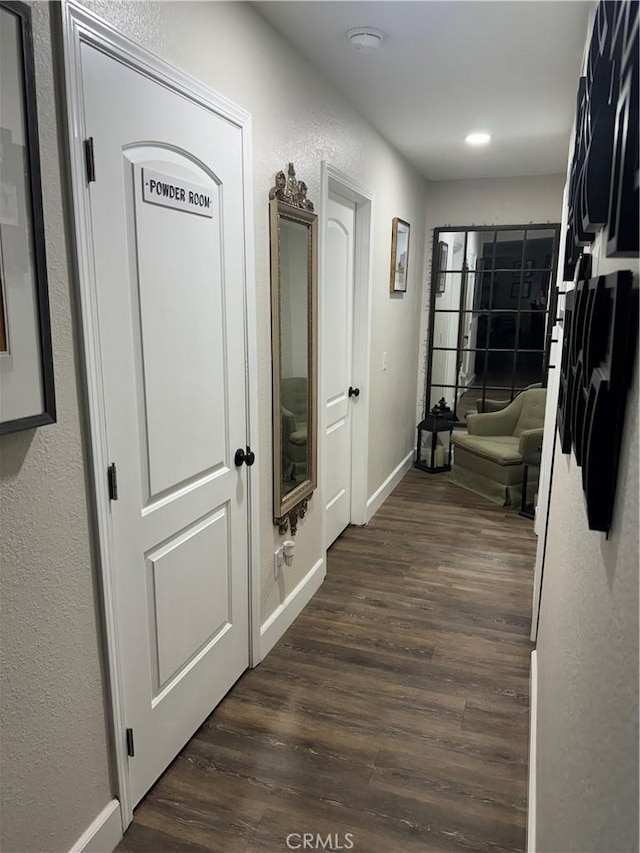 hall featuring dark hardwood / wood-style floors