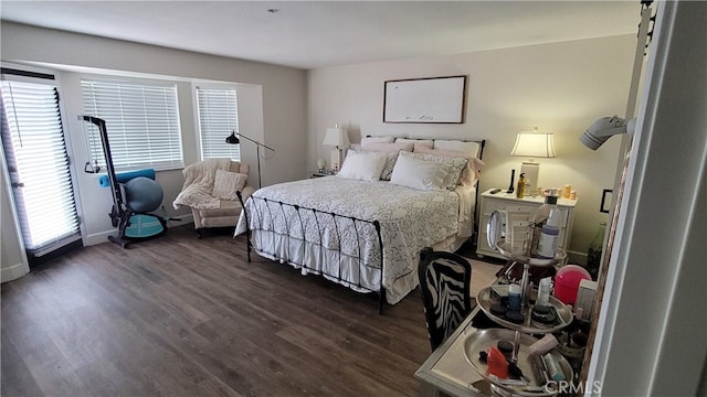 bedroom featuring dark wood-type flooring