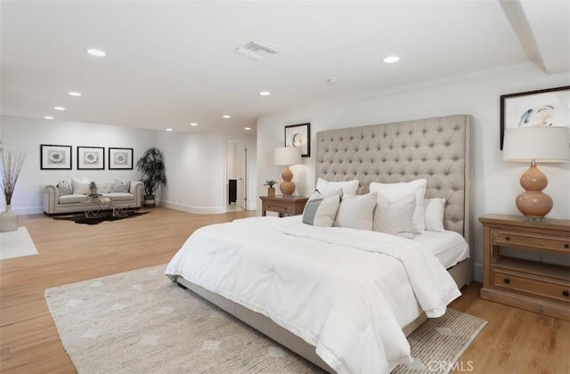 bedroom with light hardwood / wood-style flooring