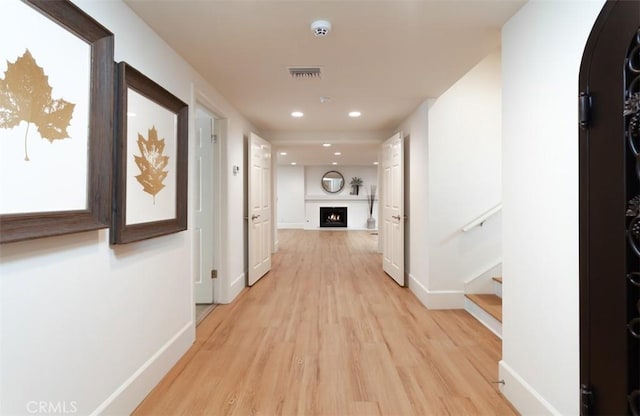 hall featuring light hardwood / wood-style floors