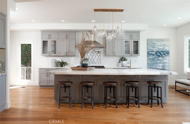 kitchen featuring a healthy amount of sunlight and gray cabinetry