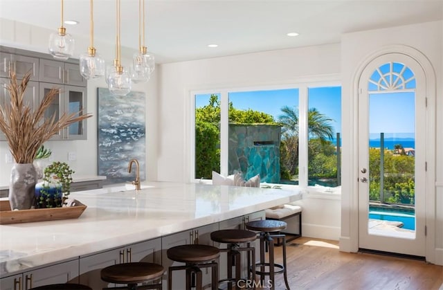 interior space featuring light hardwood / wood-style flooring and sink