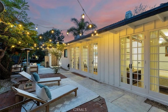 patio terrace at dusk with french doors