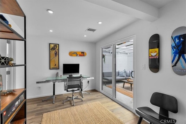 home office featuring hardwood / wood-style floors