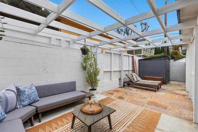 view of patio featuring an outdoor hangout area and a pergola