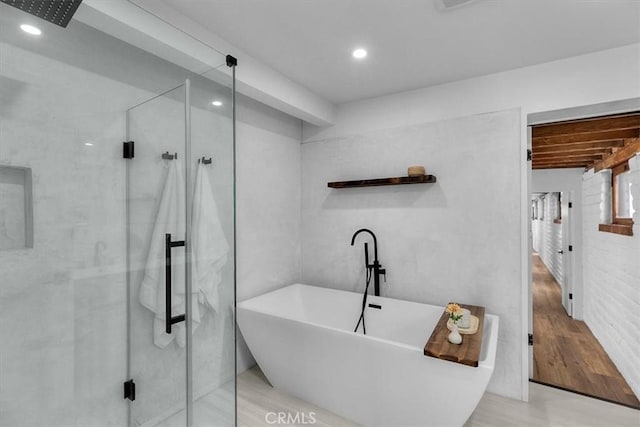 bathroom with independent shower and bath