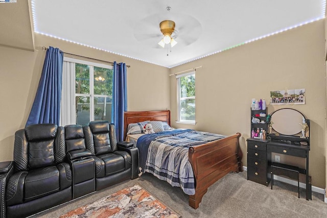 bedroom with ceiling fan and carpet floors