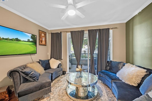 living room with ceiling fan and crown molding