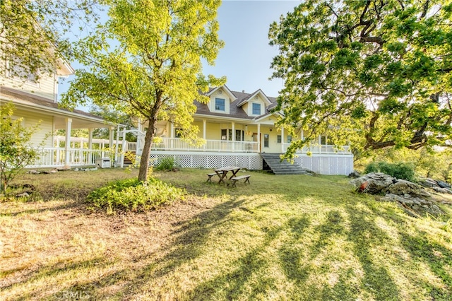 view of yard with covered porch