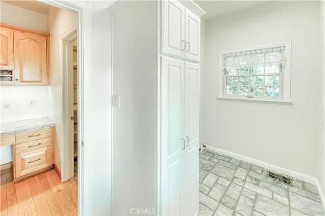 interior space with light brown cabinetry