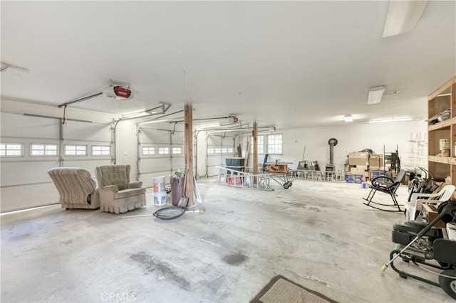 garage featuring a garage door opener