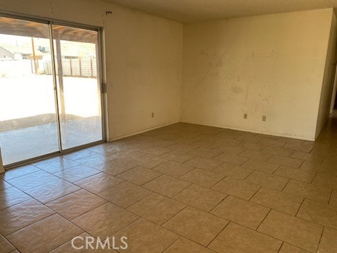 view of tiled empty room