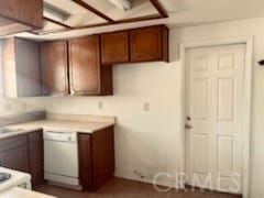 kitchen featuring white dishwasher