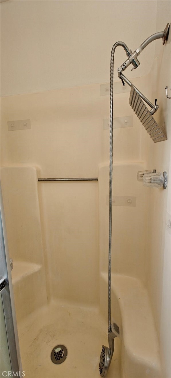 bathroom with a stall shower