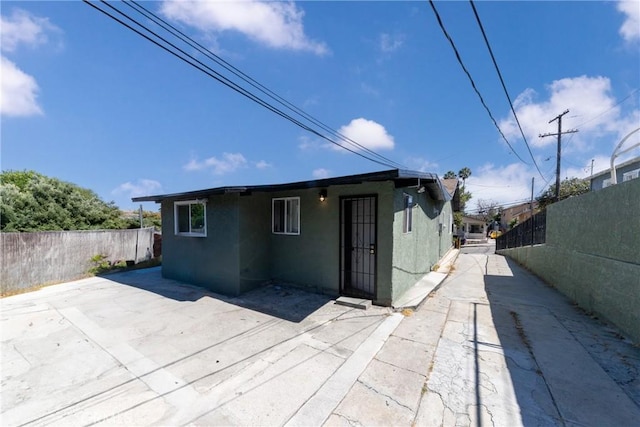 back of house with a patio area