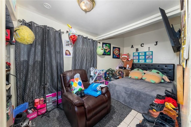 bedroom with light tile patterned flooring