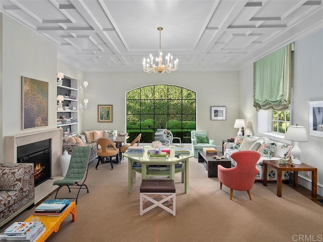 carpeted living room with built in shelves, coffered ceiling, a healthy amount of sunlight, and an inviting chandelier