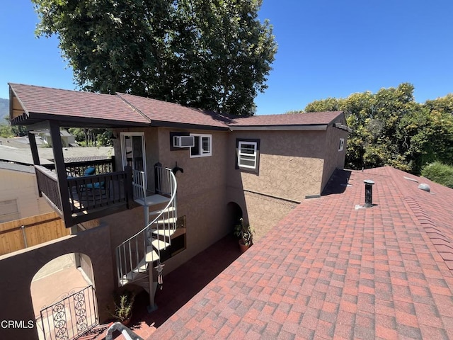 view of patio / terrace featuring a wall mounted air conditioner