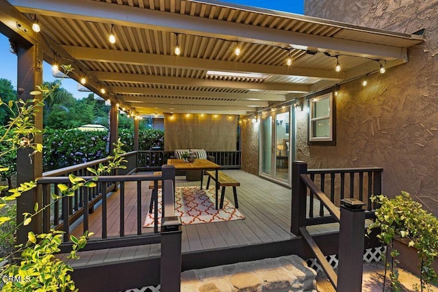 wooden deck featuring a pergola