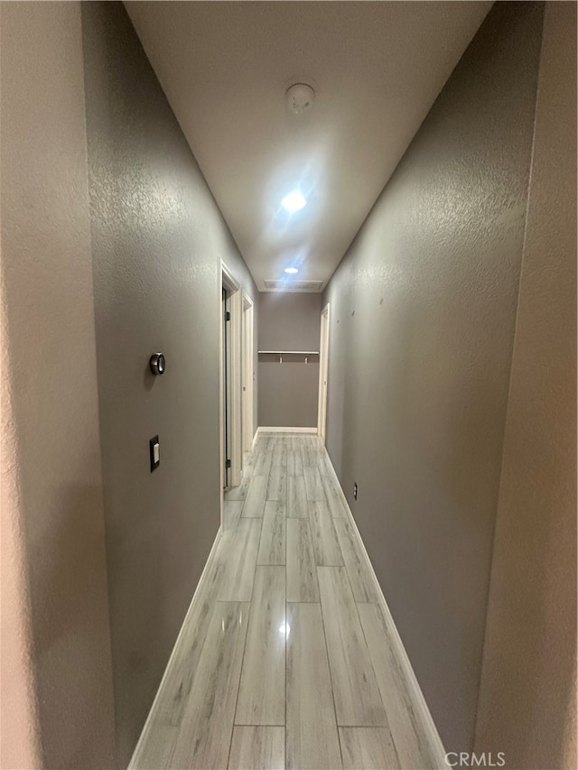 hall featuring light hardwood / wood-style floors