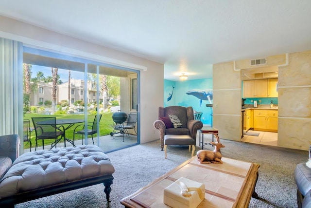 living room with light carpet