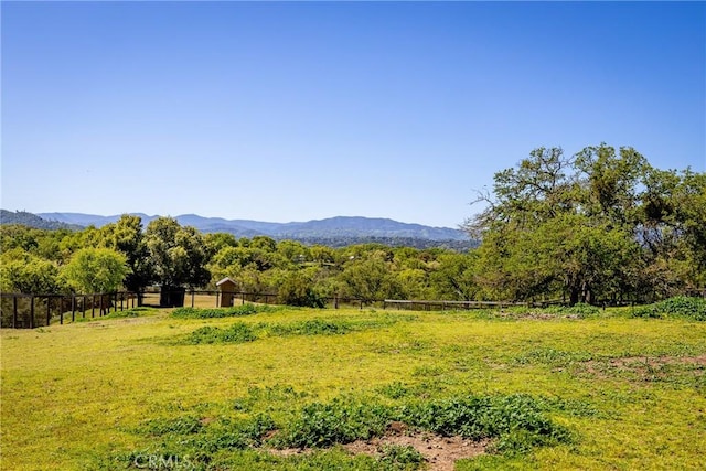 property view of mountains featuring a rural view