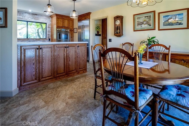 dining room with a notable chandelier