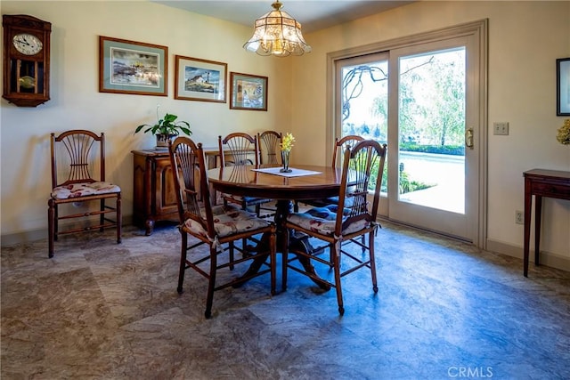 dining area with a chandelier