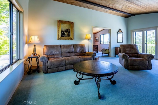 living room with plenty of natural light, carpet floors, wooden ceiling, and vaulted ceiling