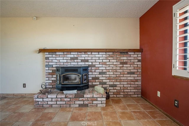 details with a textured ceiling and a wood stove