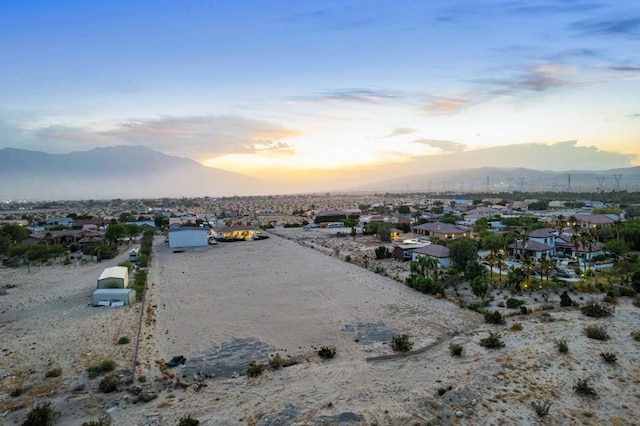 aerial view at dusk with a mountain view