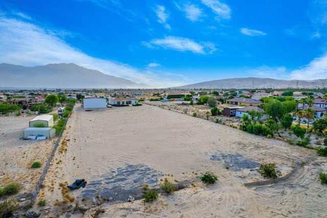 exterior space featuring a mountain view