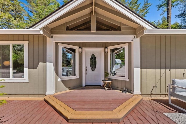 entrance to property with a wooden deck