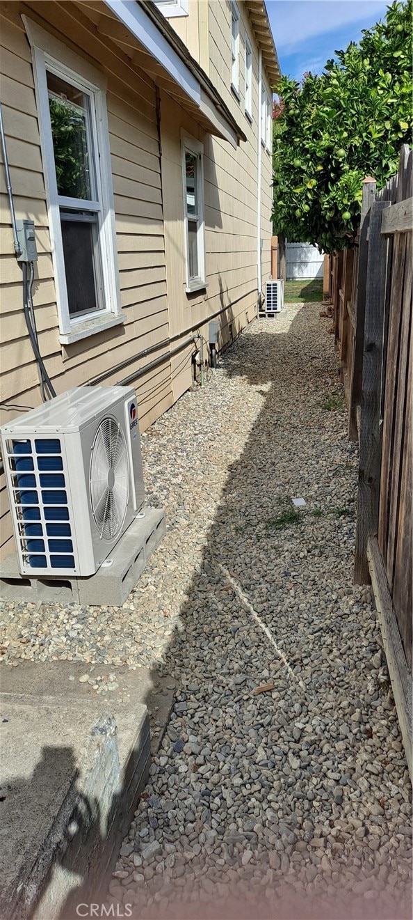 view of yard featuring central AC unit