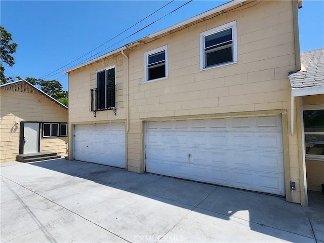 exterior space with a garage