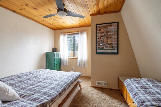 bedroom featuring ceiling fan, light carpet, wooden ceiling, and lofted ceiling