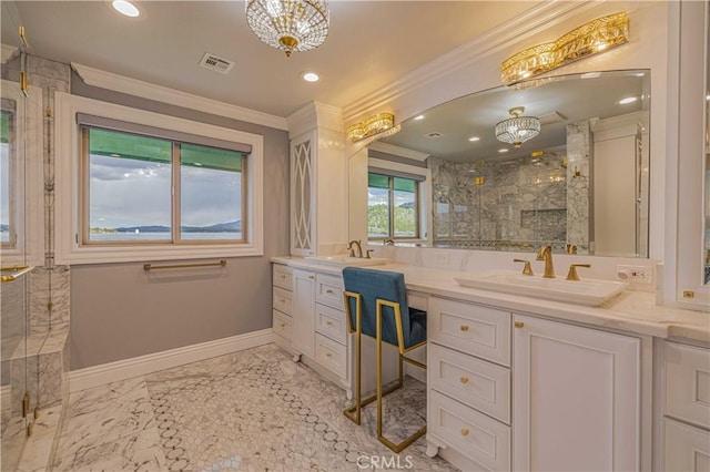 bathroom featuring vanity, an inviting chandelier, crown molding, and an enclosed shower