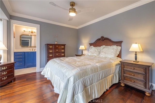 bedroom featuring ceiling fan, dark hardwood / wood-style flooring, crown molding, and connected bathroom