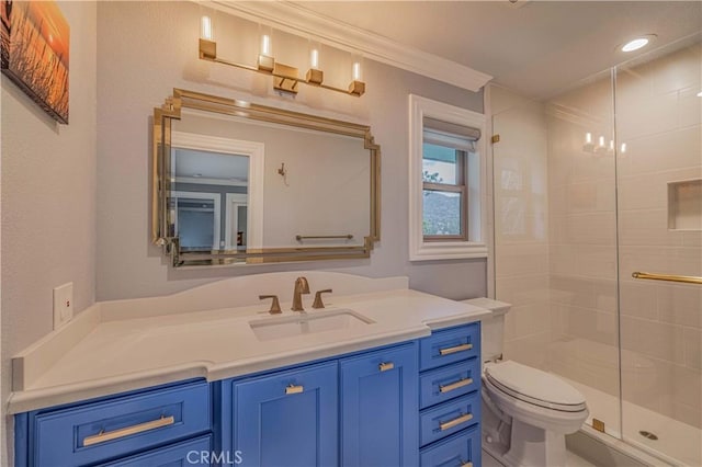 bathroom featuring toilet, vanity, walk in shower, and crown molding