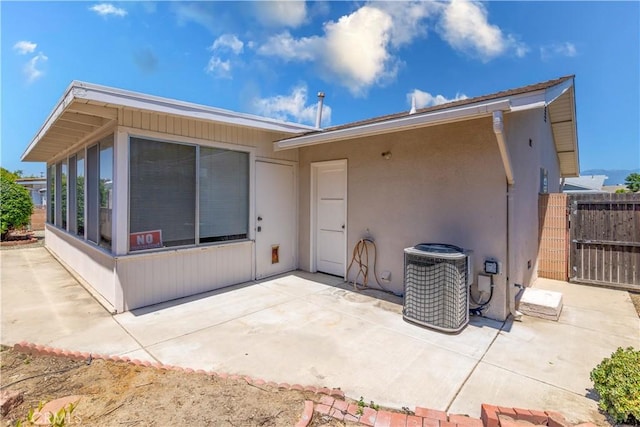 rear view of house featuring a patio