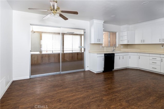 kitchen featuring ceiling fan, backsplash, dishwasher, sink, and white cabinets