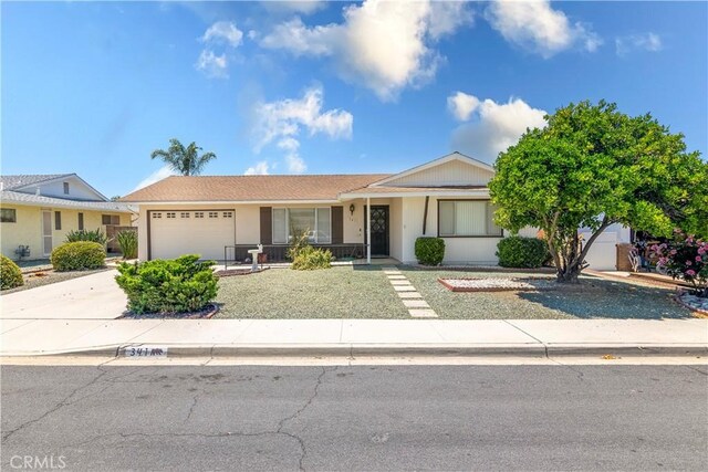 single story home with a garage