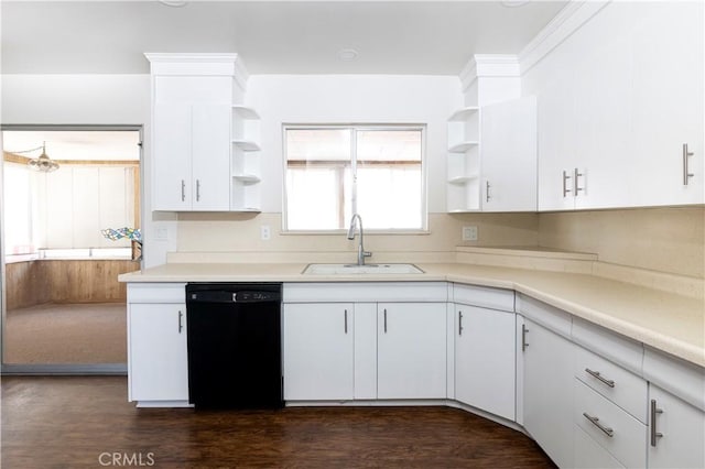 kitchen with dark wood-type flooring, white cabinets, dishwasher, and sink