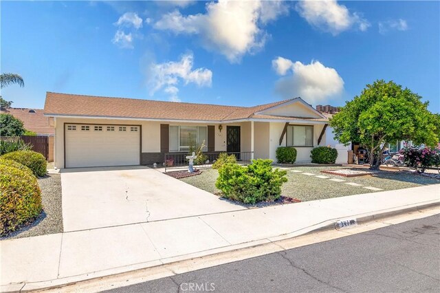 single story home with a garage