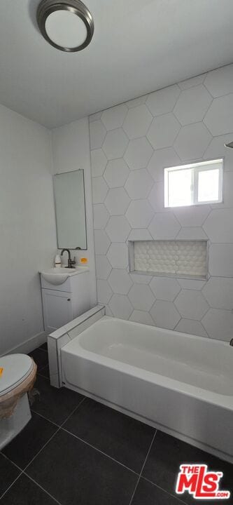 full bathroom featuring tile flooring, vanity, toilet, and shower / washtub combination