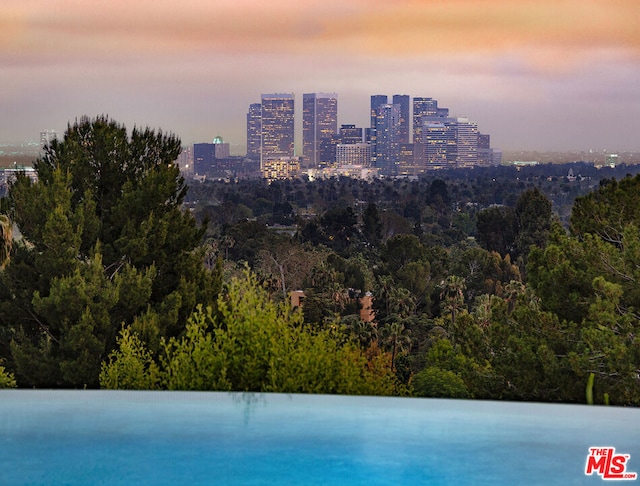 property's view of city with a water view