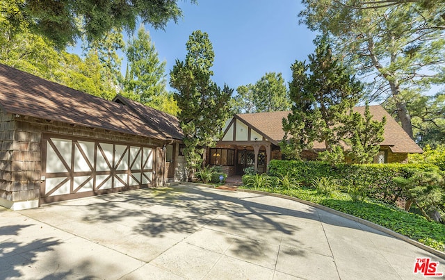 exterior space with a garage